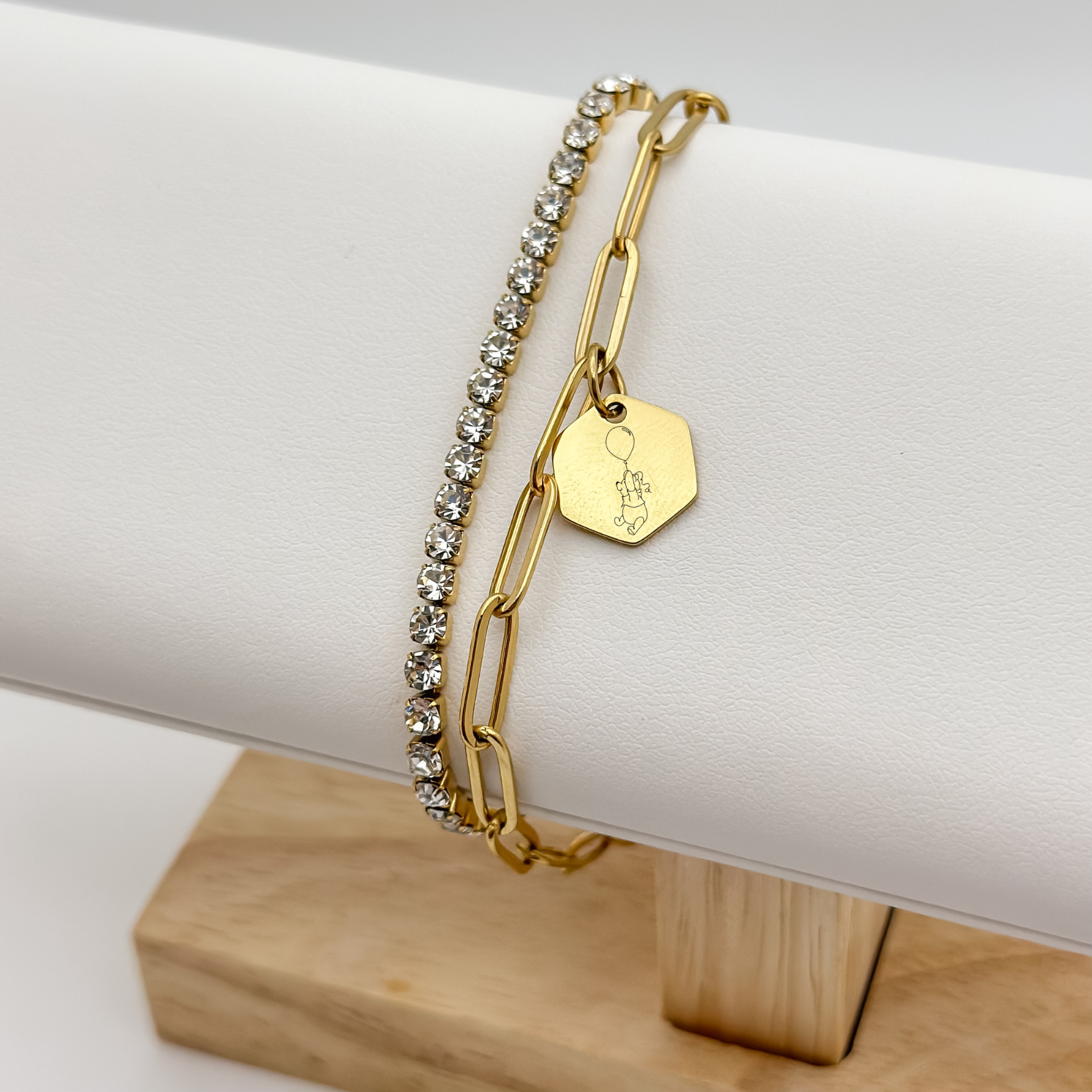 Gold Honey Bear Charm Bracelet on a paperclip chain. Gold Hexagon Charm featuring an engraved Honey Bear holding on to a balloon. Hypoallergenic, waterproof, stainless steel jewelry. 