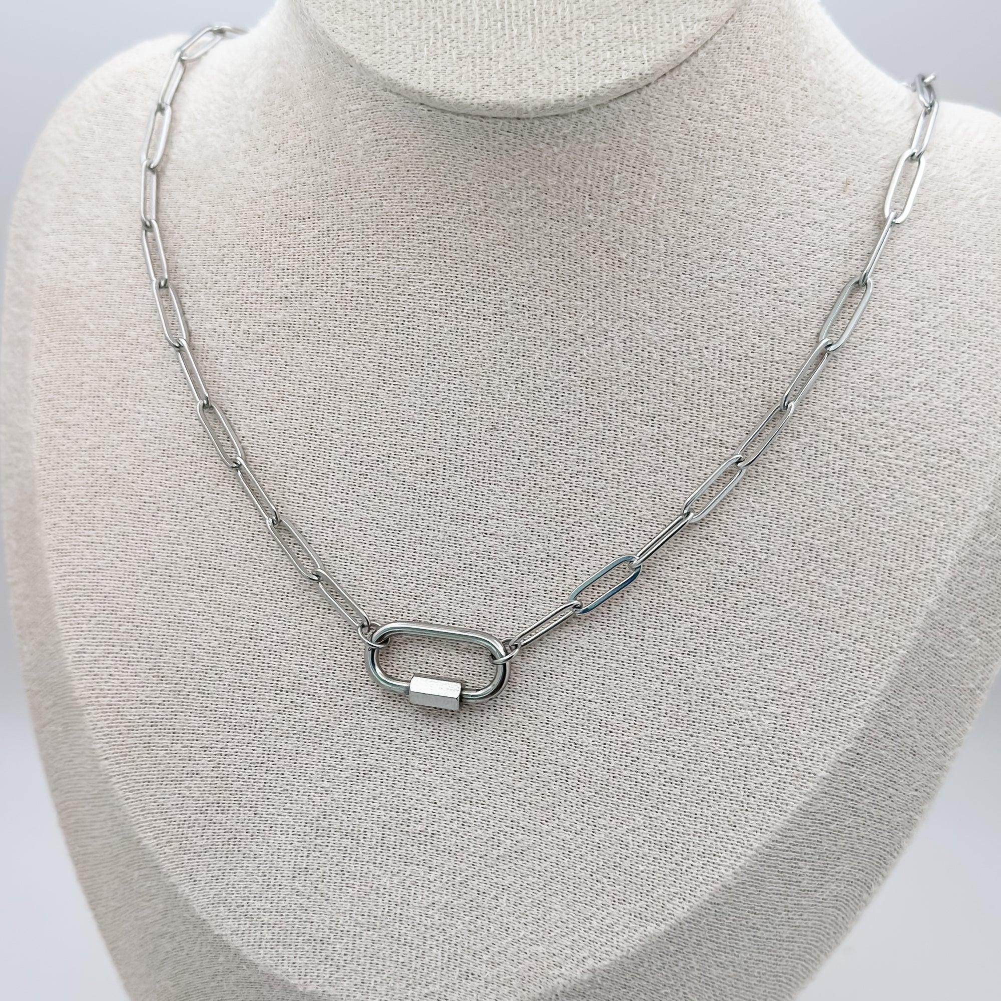 Silver chain necklace on a mannequin bust